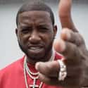 Hip hop music, Atlanta hip hop, Gangsta rap   Radric Delantic Davis, better known by his stage name Gucci Mane, is an American rapper. He debuted in 2005 with Trap House, Trap-A-Thon, and Back to the Trap House in 2007.