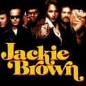 Robert De Niro, Samuel L. Jackson, Quentin Tarantino   Jackie Brown is a 1997 drama film written and directed by Quentin Tarantino.