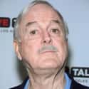 age 79   John Marwood Cleese is an English actor, comedian, writer and film producer. He achieved success at the Edinburgh Festival Fringe and as a scriptwriter and performer on The Frost Report.