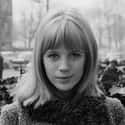 Pop music, Rock music, Folk music   Marianne Evelyn Faithfull is an English singer, songwriter and actress, whose career has spanned six decades. Her early work in pop and rock music in the 1960s.