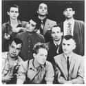 Synthpop, New Wave, Gothic rock   Oingo Boingo was an American rock band, best known for their hits "Dead Man's Party" and "Weird Science".