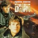 Charlie Sheen, Patrick Swayze, Lea Thompson   Red Dawn is a 1984 American film directed by John Milius and co-written by Milius and Kevin Reynolds. It stars Patrick Swayze, C.