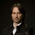 age 54   Robert Carlyle, OBE is a Scottish actor.